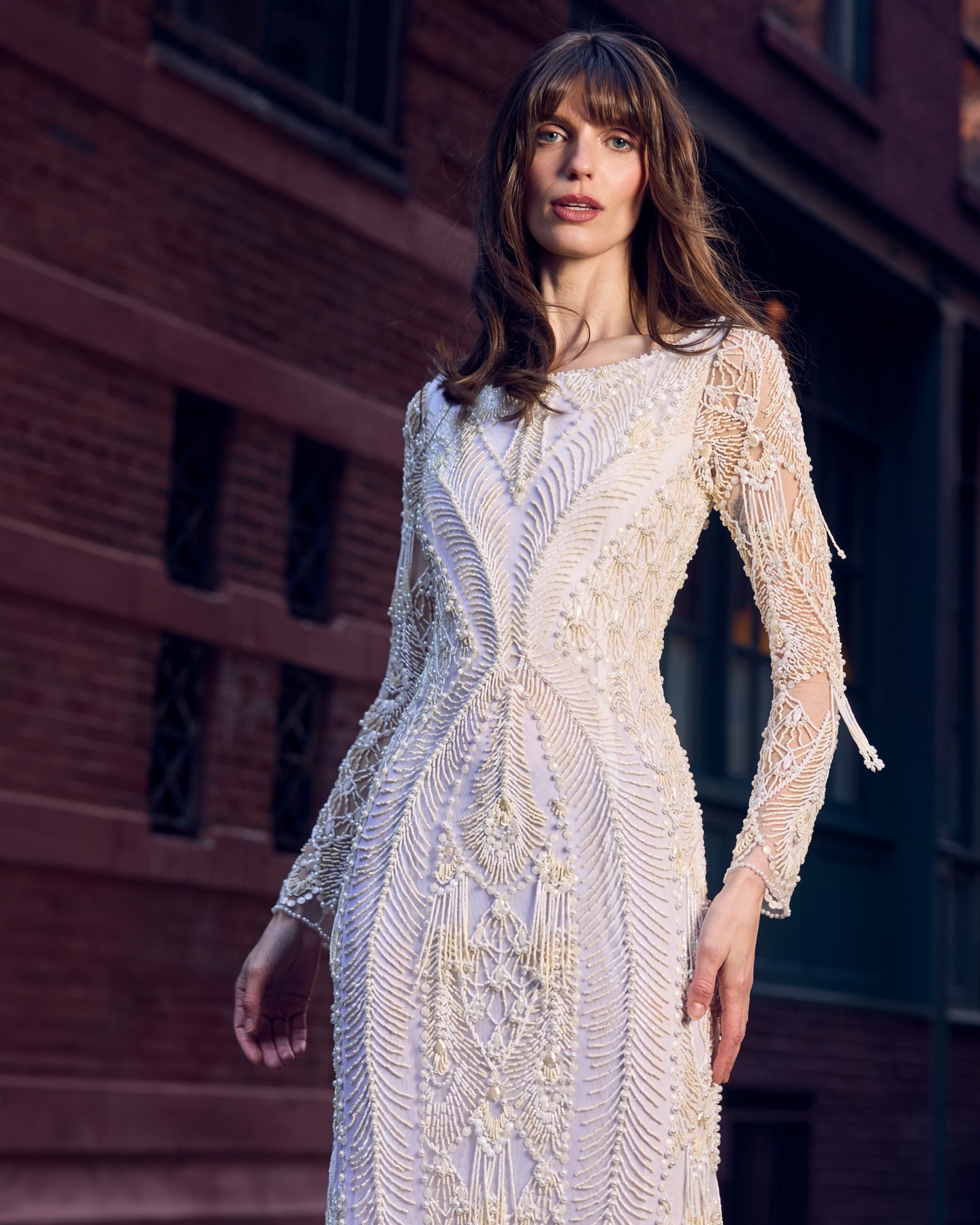 Beading detail on a long-sleeve PatBO gown