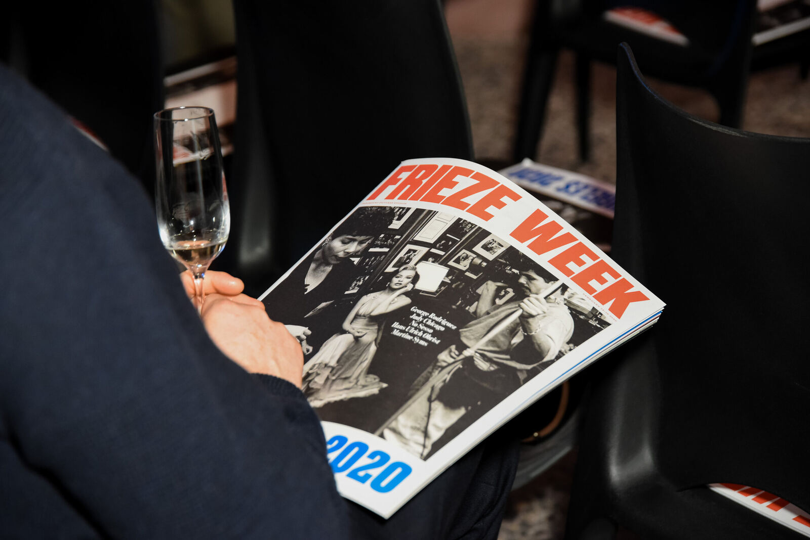 Frieze Week 2020 magazine in a guest’s hands