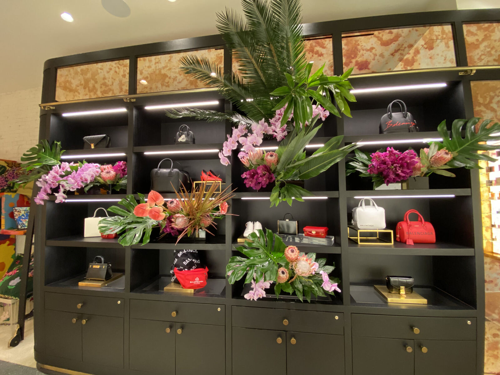 Store shelves dressed with florals and collaboration pieces