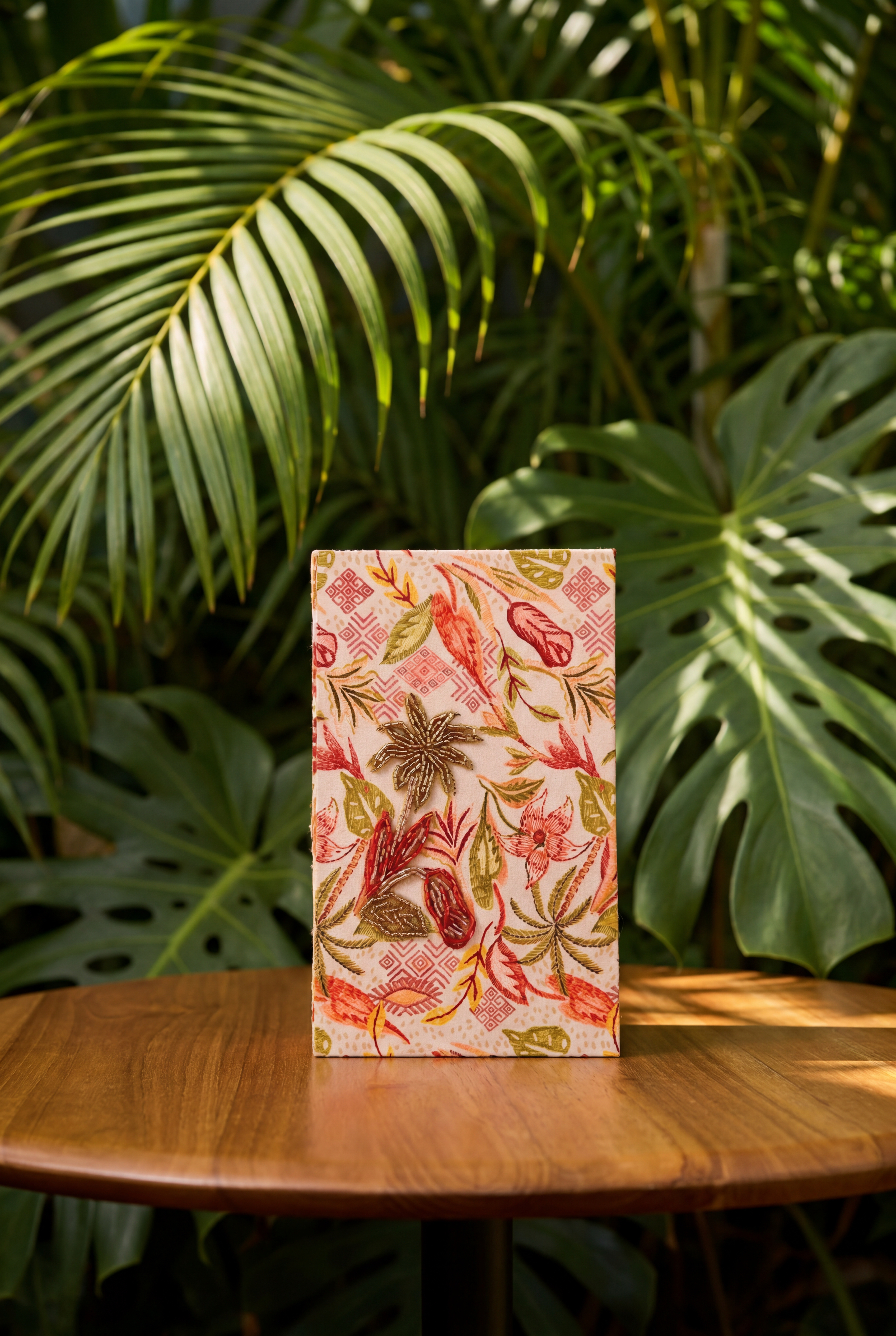 The hand-beaded Zacapa × PatBO box in the PatBO print