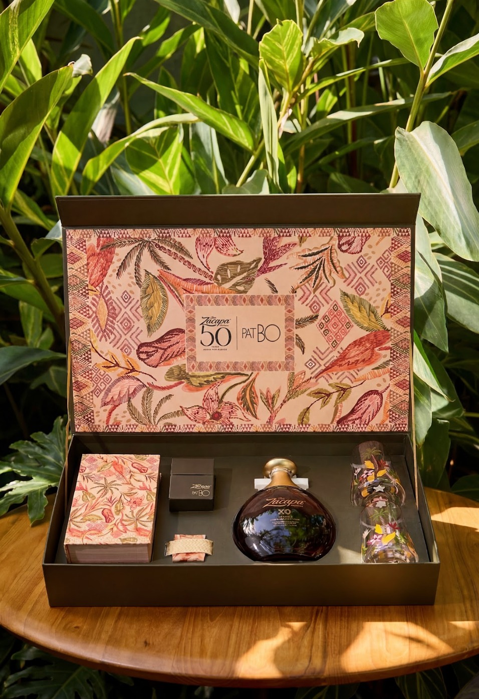 Zacapa XO bottle with hand-painted glasses in the full kit